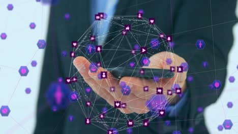 Animation of globe of connections with icons over businessman using smartphone