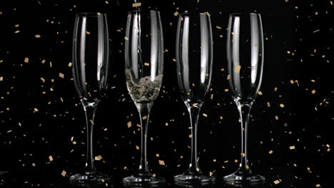 animation of confetti falling over glasses of champagne on black background