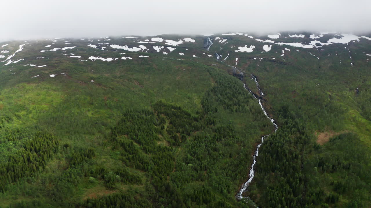 Aerial drone over the green majestic landscape in Norway.