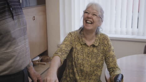 senior woman using walker with support