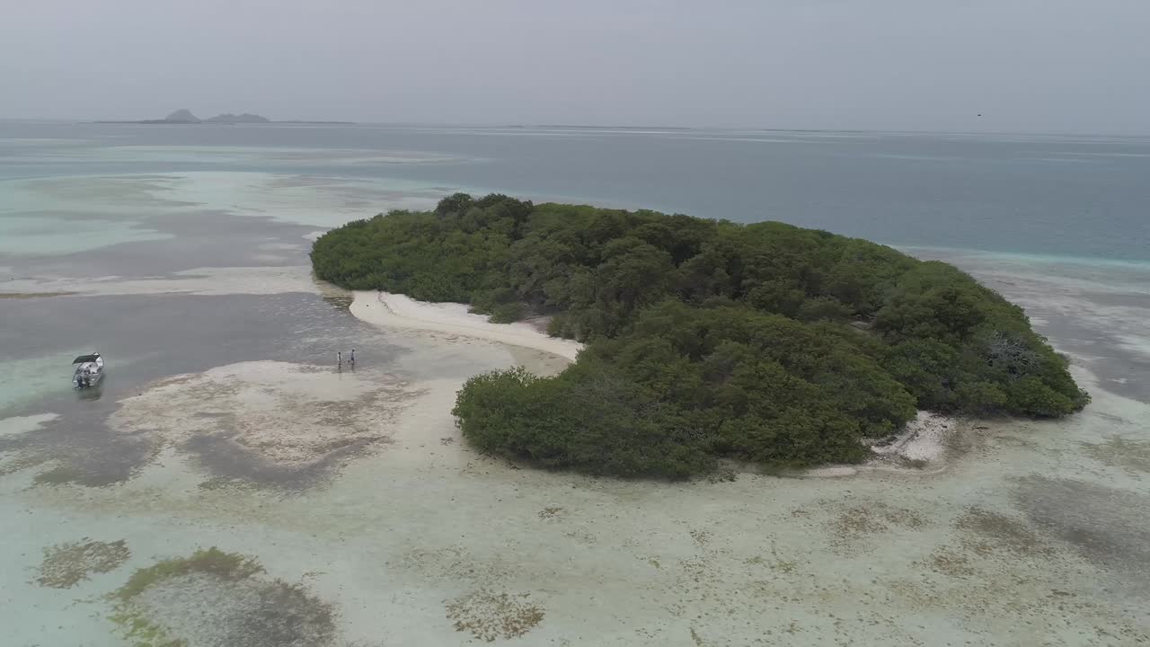 Aerial 360 degree view of a mangrove island at-Los Roques-National-Park-Venezuela