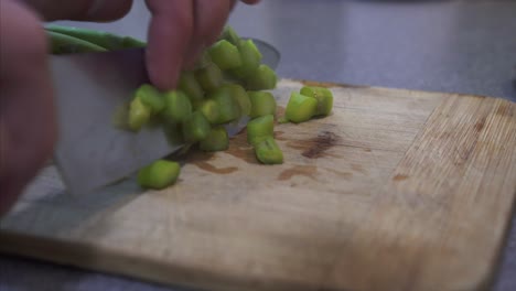 Chef-preparing-and-Chopping-Steamy-Asparagus
