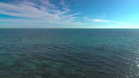 fixed shot of calm ocean waves on the mediterranean sea