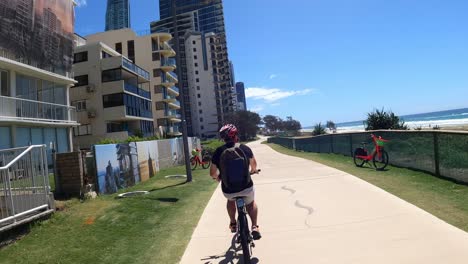 cyclist enjoying a sunny coastal pathway ride