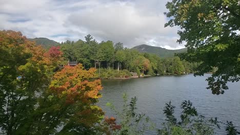 Quiet-mountain-lake-as-clouds-move-overhead