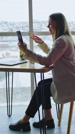 pretty business woman working with smartphone. lady office worker have a phone call. vertical video