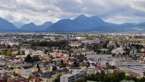 soft aerial dolly right showing beautiful alps and city of kuchljust outside salzburg austria