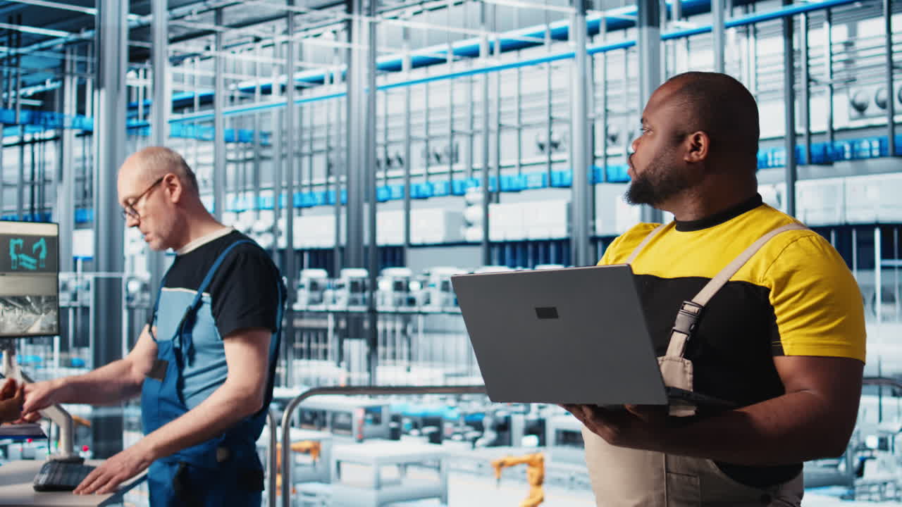 Industry 4.0 industrial plant engineer automating robotic machines using AI