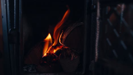 flames inside the chimney fireplace. close-up shot