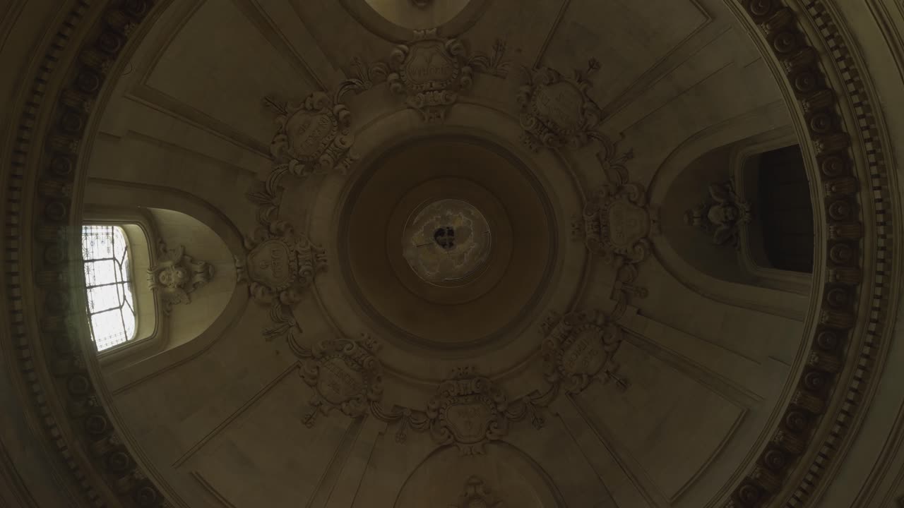 Dome ceiling inside Temple du Marais church, Paris. Low angle pov