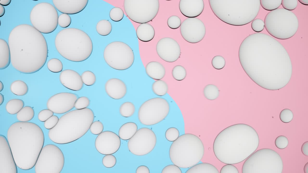 Light grey different sized molecules move in circles