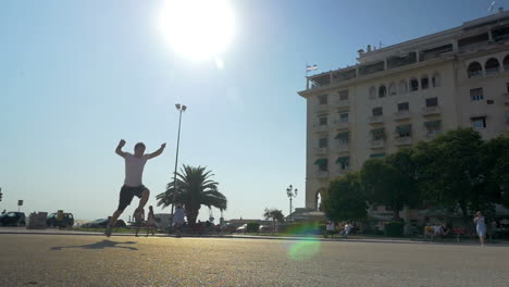 Two-young-men-showing-acrobatic-exercise-in-the-street