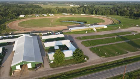 horse race track and facility buildings in isabella county fairgrounds, aerial view