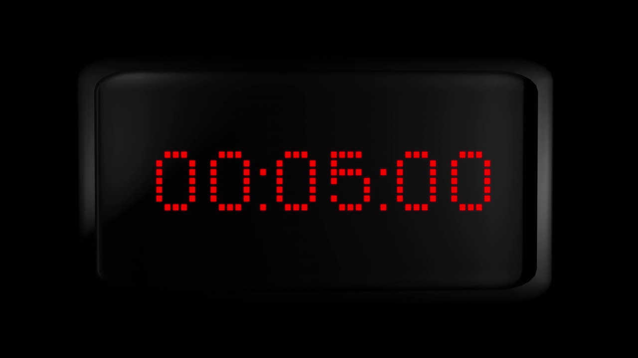 Animation of red digital timer changing on black background