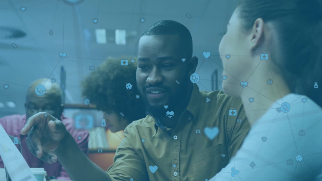 Animation of network of connections with icons over diverse business people having meeting at office