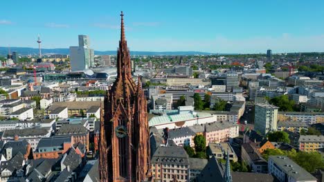 4k aerial drone video of the gothic details of the tower of the historic kaiserdom st. bartholomäus church in downtown frankfurt, germany