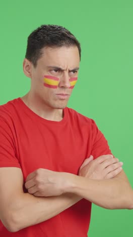 spanish patriot man looking away with serious expression