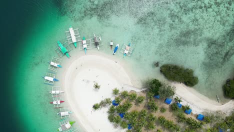 drone top view over tropical seascape of pass island in coron, philippines