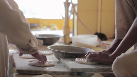 naan bread preparation, traditional pakistani and indian cuisine.