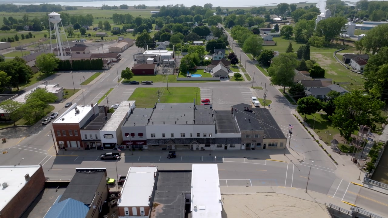 Sebewaing, Michigan downtown with drone video moving sideways.
