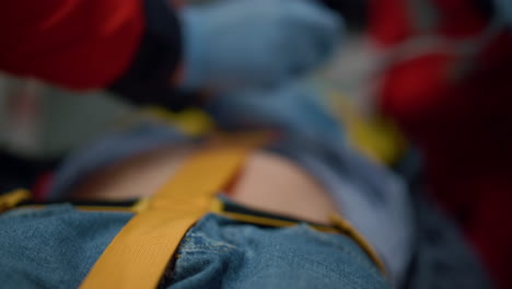 Doctor-hands-examining-man-with-stethoscope.-Paramedics-providing-first-aid