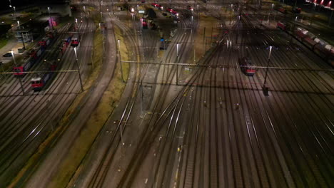 aerial night flyover of railway yard, zurich, switzerland