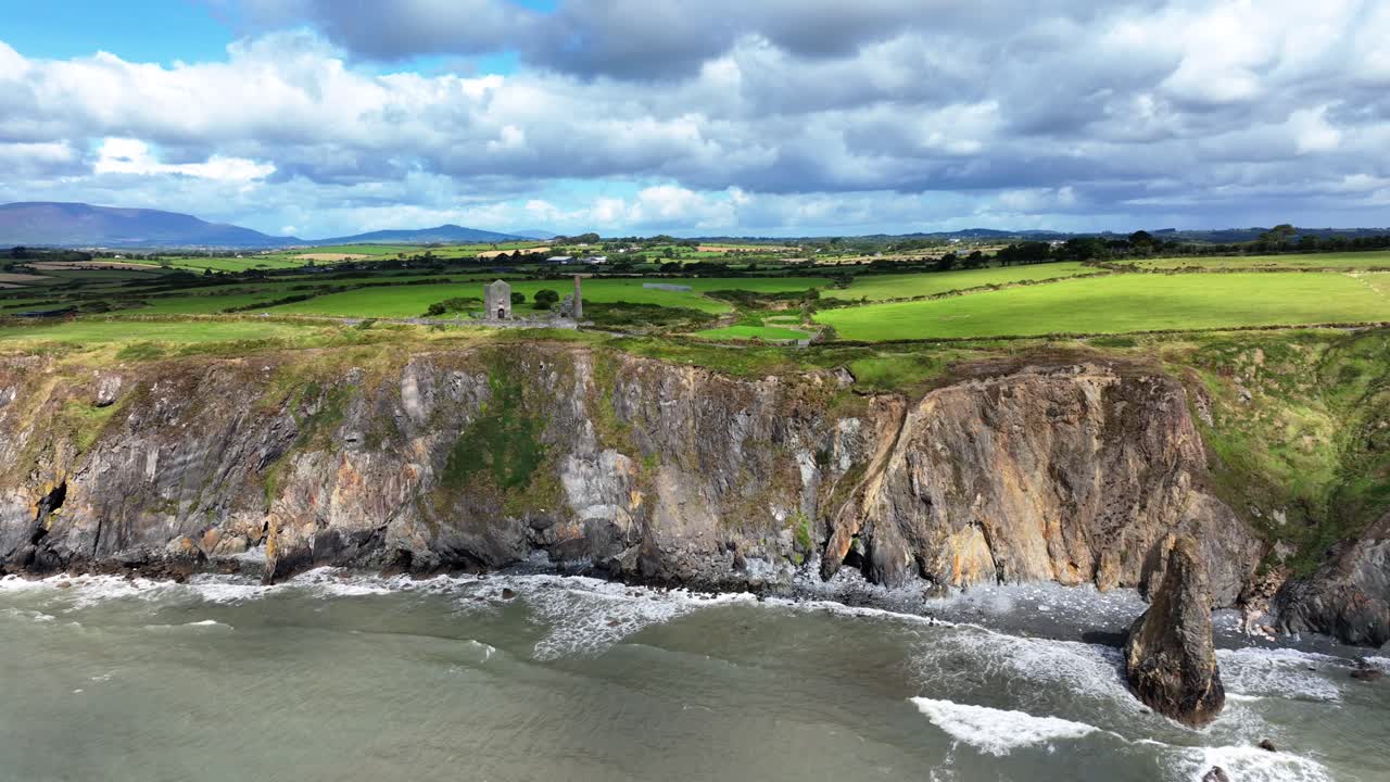Ireland Epic Locations dramatic light as shadows move over the sea cliffs at Copper Coast Waterford Ireland
