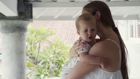 baby starting crying in mothers arms