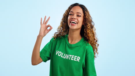 Face,-woman-and-volunteer-with-ok-sign