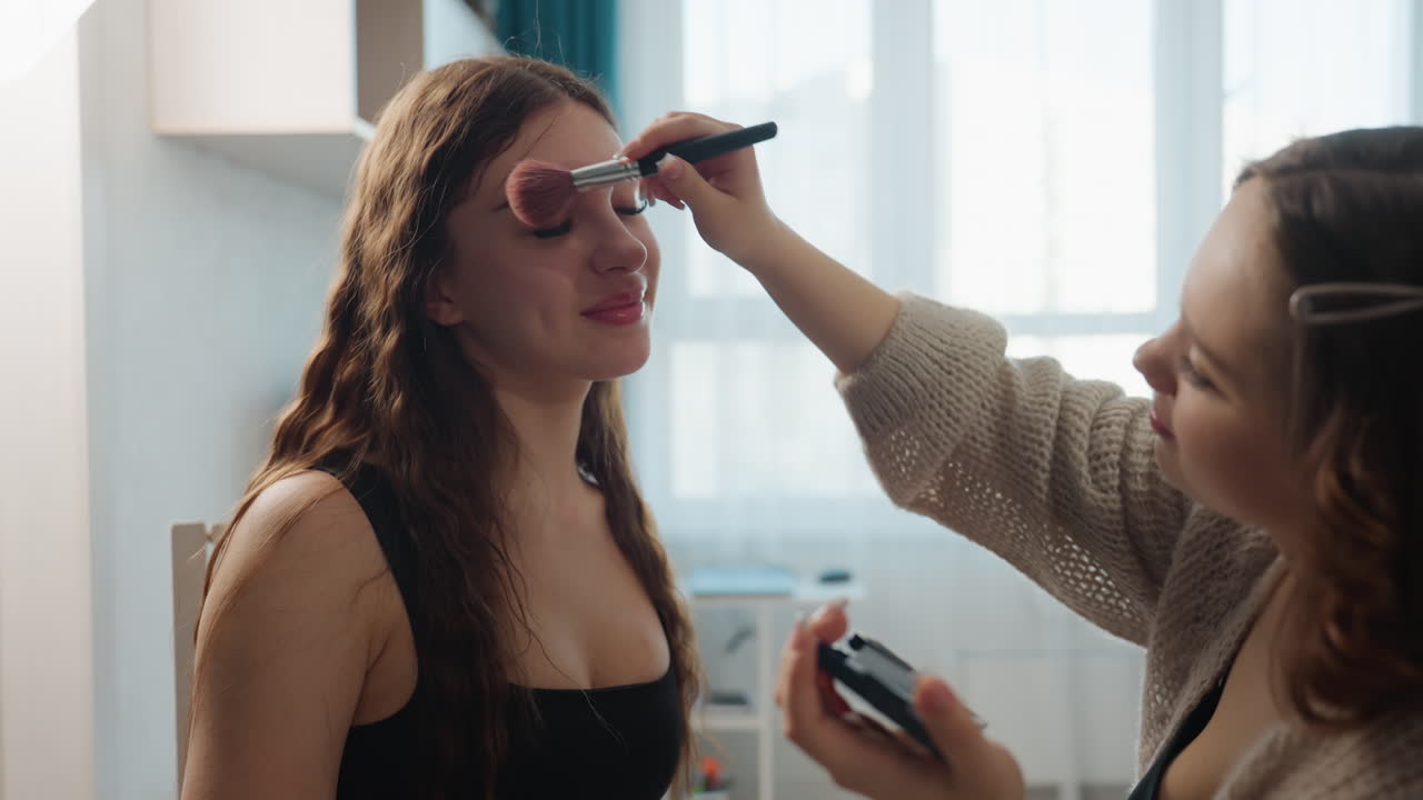 Casual Scene With Cheerful Friend Preparing Makeup, Luminous Skin And Friendly Mood In Cozy Living Space, Woman With Glowing Complexion And Joyful Atmosphere In Comfortable Home Setting