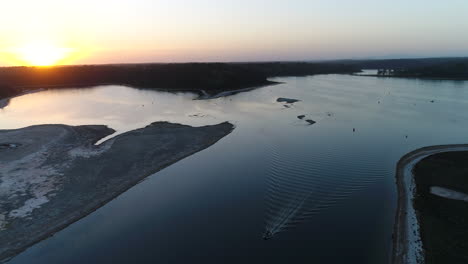 aerial of sunset over water