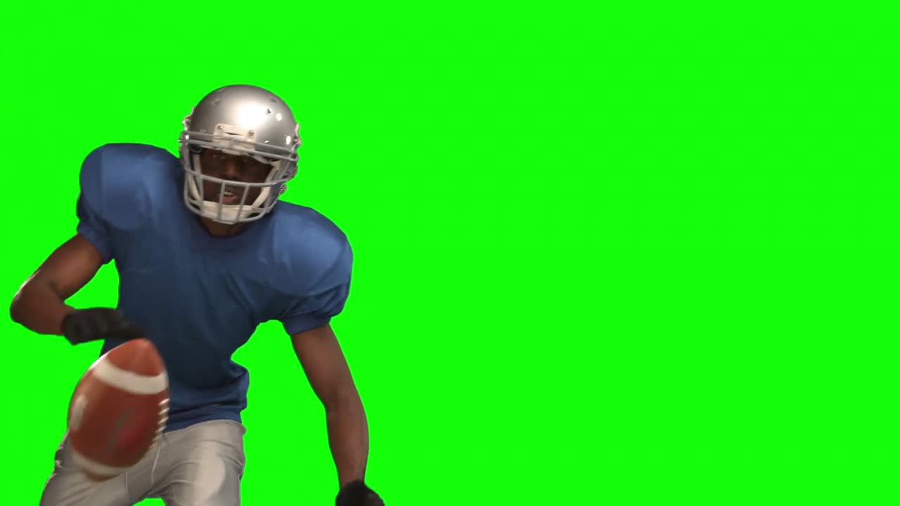 jugador de fútbol americano atrapando la pelota