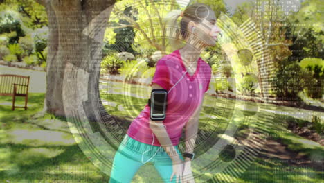 stretching in park, woman with armband over digital interface animation