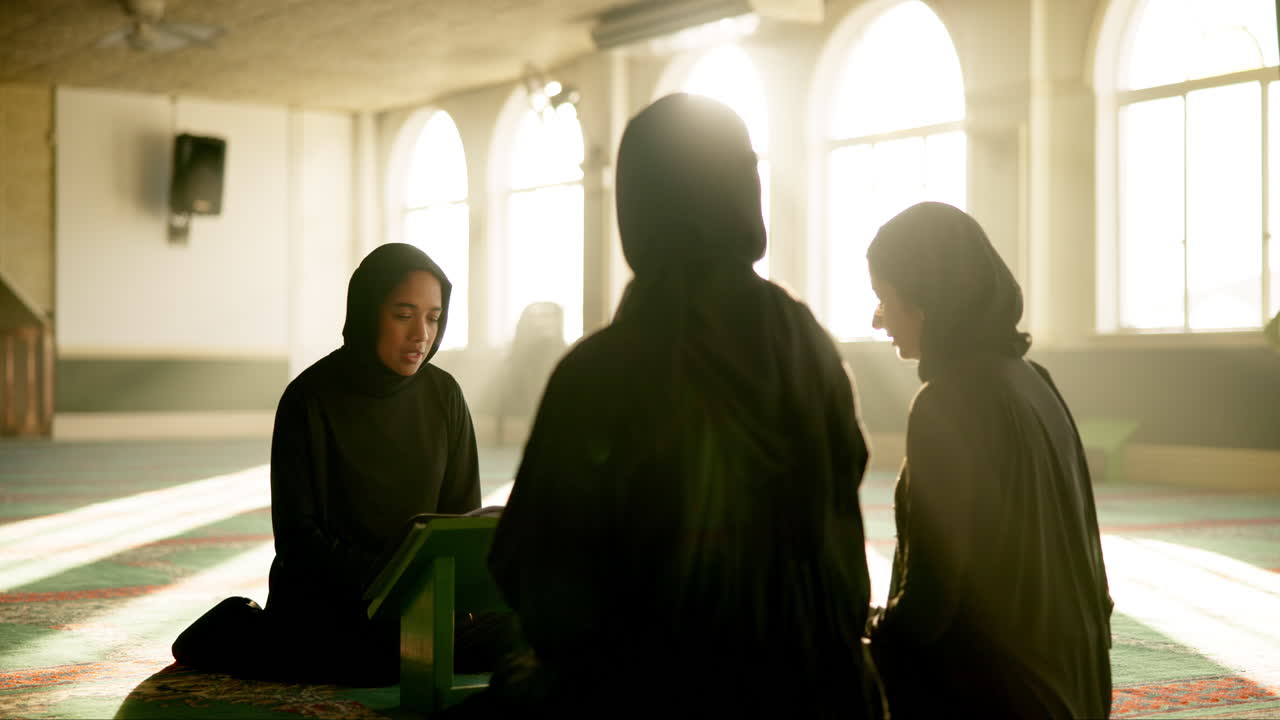 Muslim women praying in a mosque