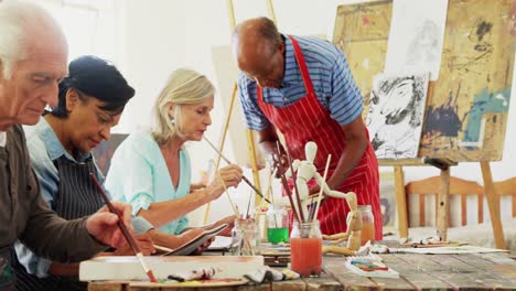Artists working together at table 4k