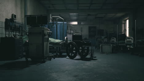 abandoned hospital room with an empty wheelchair in dim light
