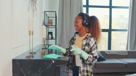 enjoying a sunny day while cleaning the living room in a cozy apartment