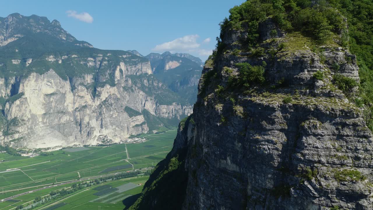 Steep Rock Face Cliffs With Vineyards In Trentino, Dolomites, Italy. Aerial Close-up Shot
