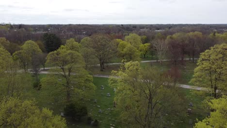 cemetery-drone-aerial-footage-Grand-Rapids-Michigan-with-green-foliage-and-trees