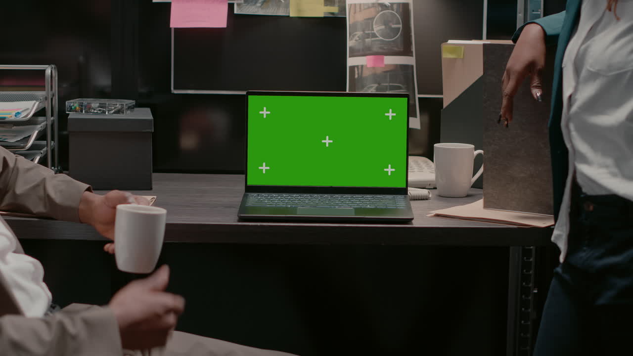 Detective office scene with laptop green screen