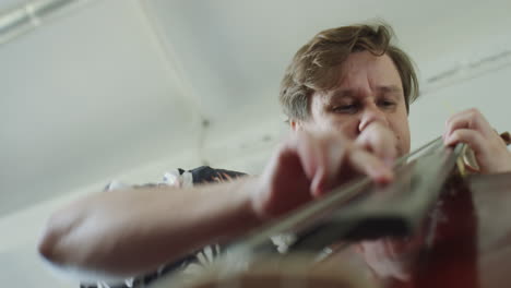 musician playing string instrument