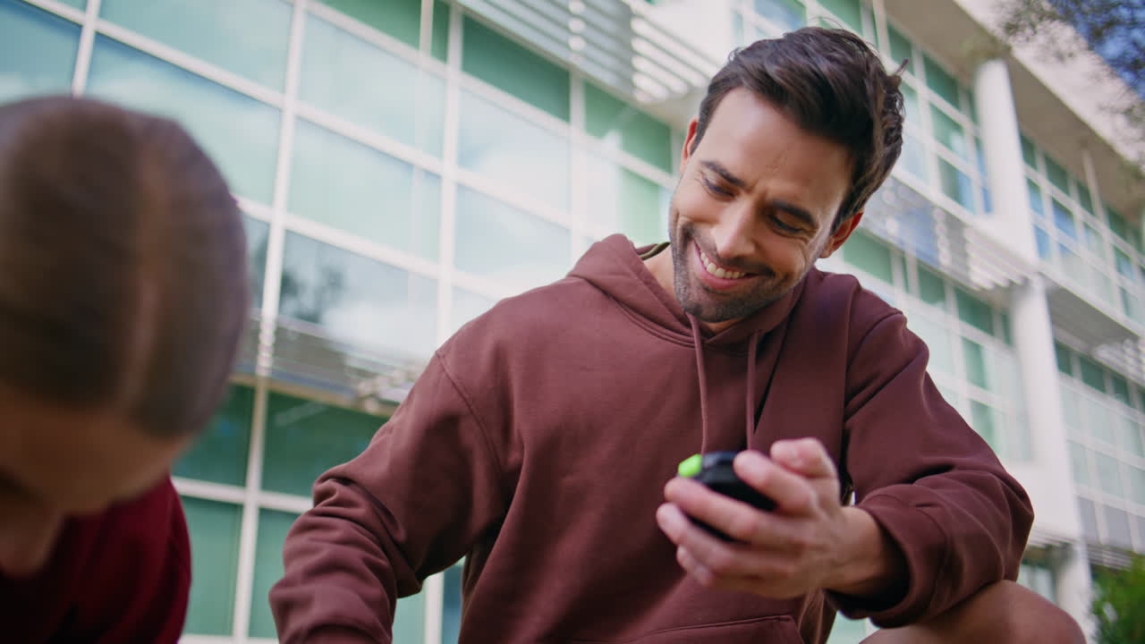 Fitness coach training girl outdoors. Closeup smiling man support assist woman