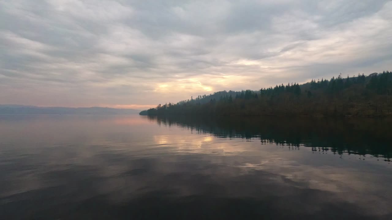 Misty scene over Lake Windermere in the English Lake District National Park