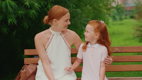mother and daughter enjoying time in the park