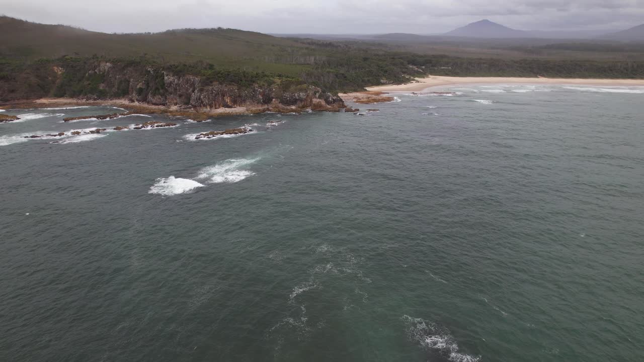 Diamond Head Beach Against Cloudy Sky In NSW, Australia - Drone Shot