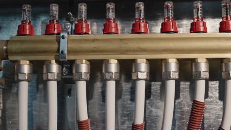 heating system comb - many plastic pipes go into the floor to heat the room. slider shot