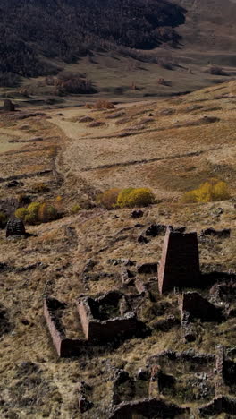 ancient village ruins in a mountain valley