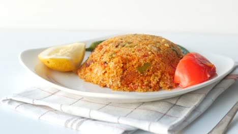 delicious bulgur pilaf with vegetables and lemon