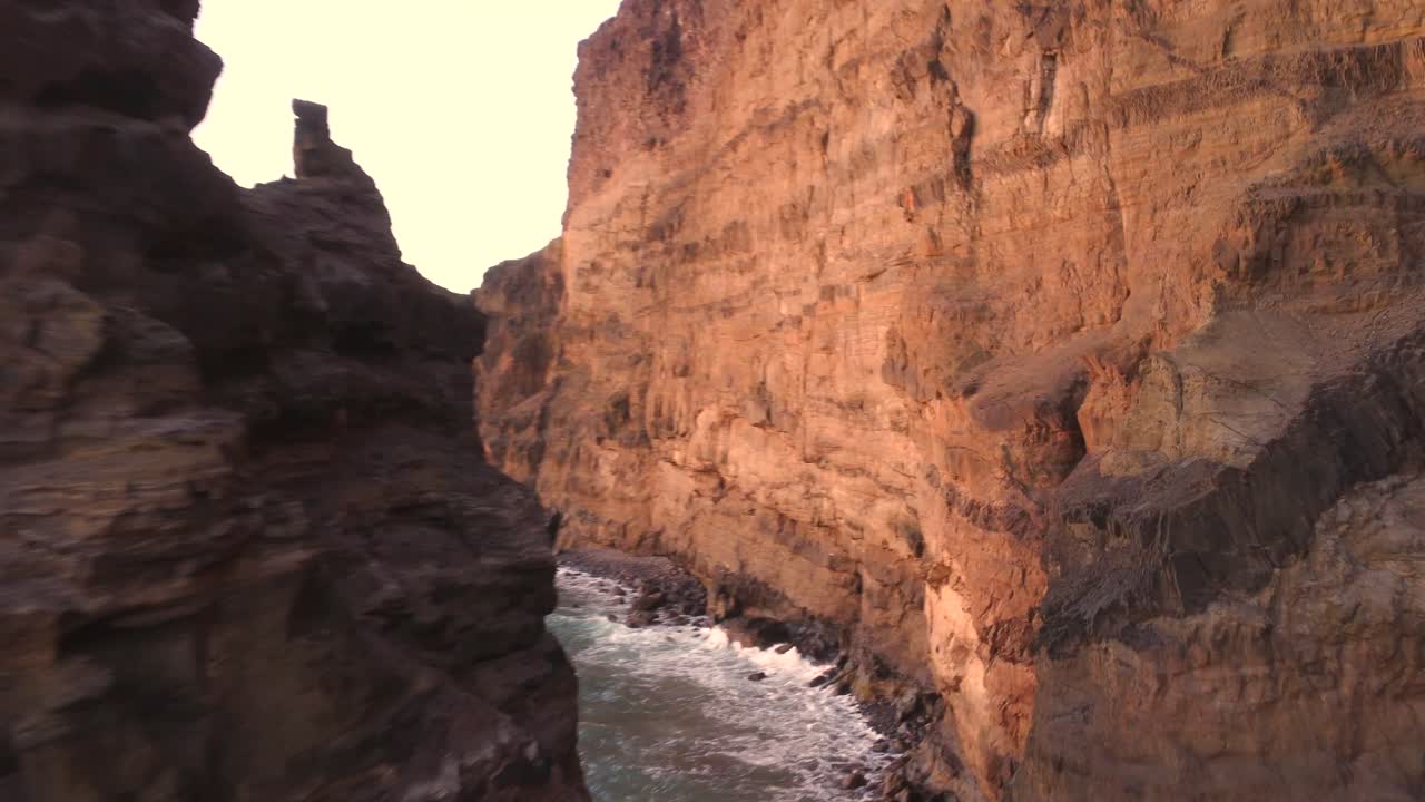 Coastal Views with Cliffs and Town at Dawn