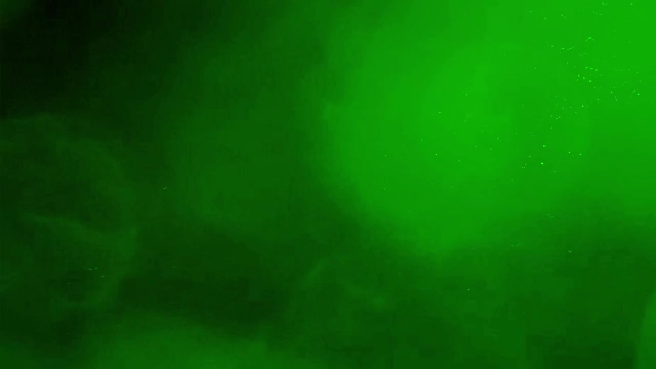 Abstrakt grønne lyslækager og partikel-overlay